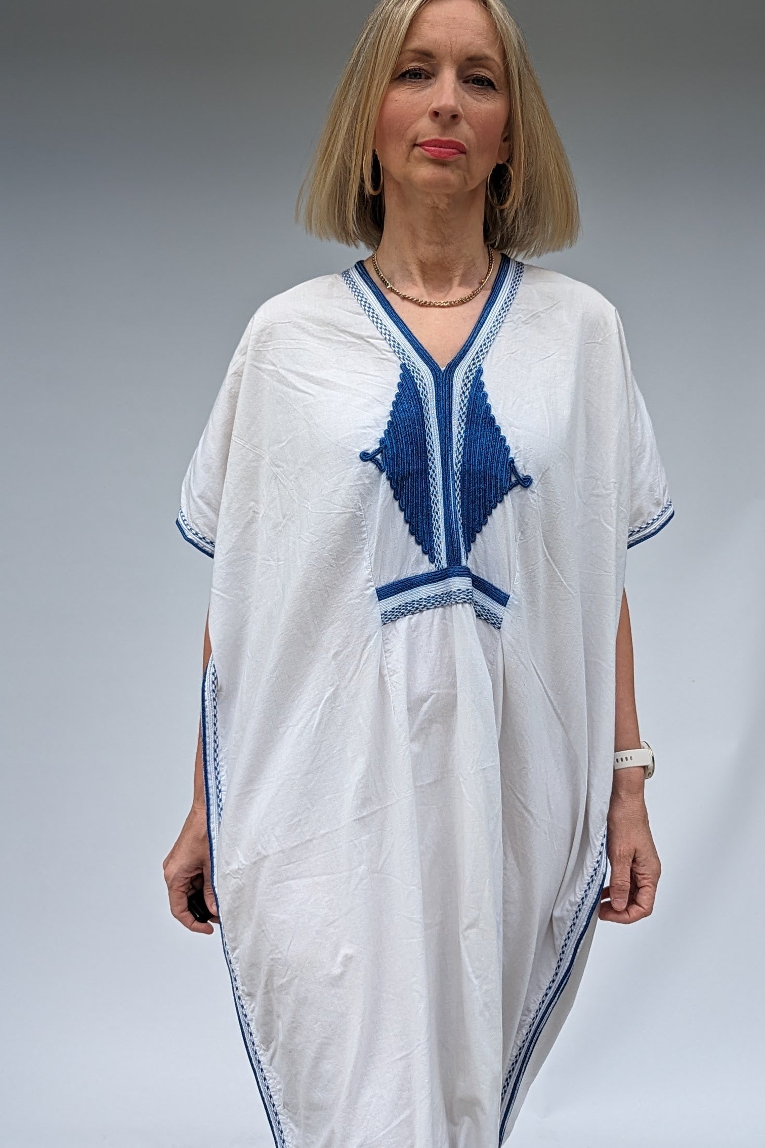 front of blue and white kaftan cover up beachwear dress