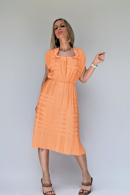 Peach bow pleated mid dress 1960s vintage