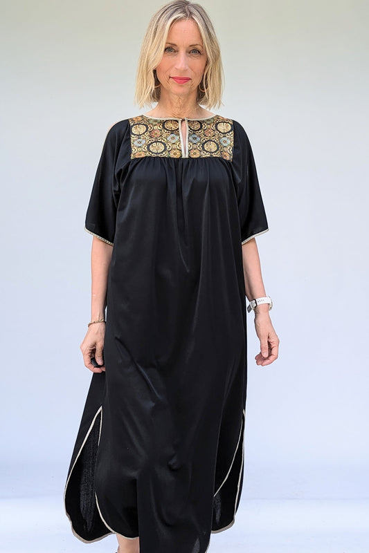 black and gold panelled vintage kaftan dress in black with silver trim 