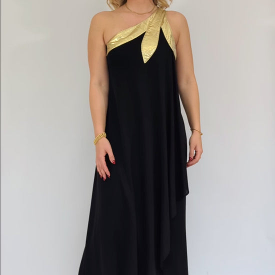 video of gold lame asymmetric black maxi dress