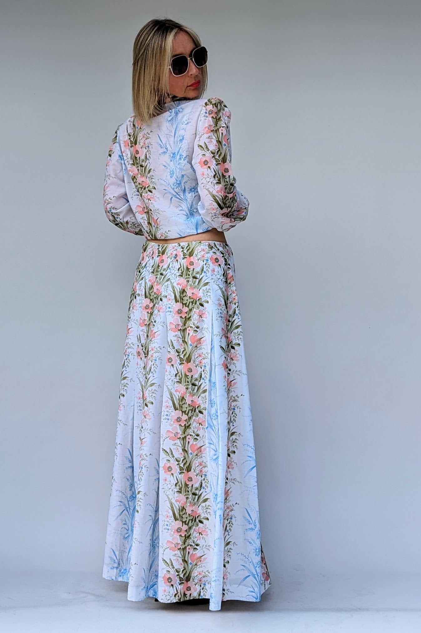 back of berkertex vintage two piece floral skirt summer suit with long sleeve blouse and maxi skirt in pinks and blues on white
