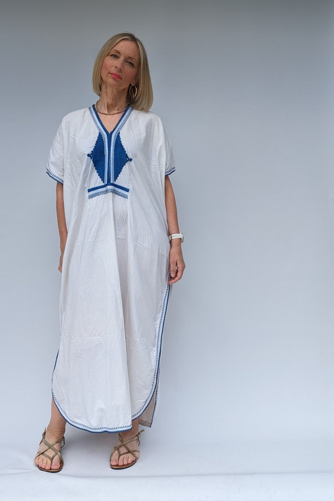 long white and blue kaftan robe